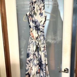 Floral maxi dress with matching sash belt.